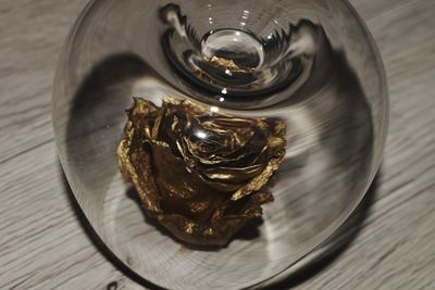 High angle view of drink in glass on table