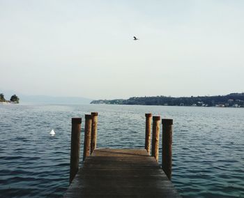 Jetty leading to calm sea