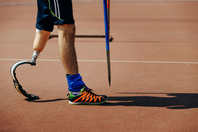 Low section of man running