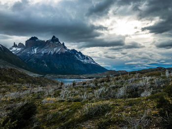 Scenic view of snowcapped mountains against sky