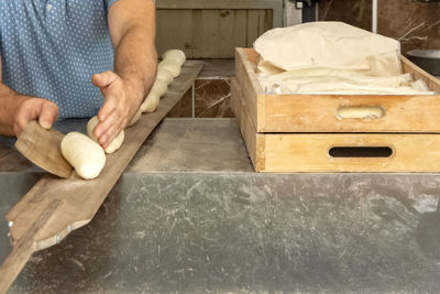 Close-up of man preparing food