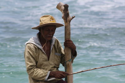 Man fishing in sea