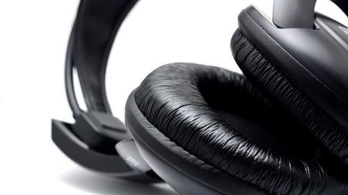 Close-up of headphones against white background