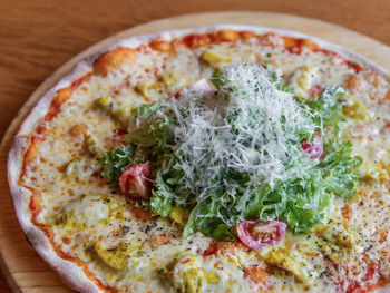 High angle view of pizza served in plate