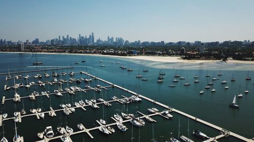 High angle view of harbor by buildings in city