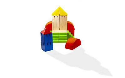 Close-up of toy over white background