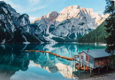 Panoramic view of snowcapped mountains and lake against sky