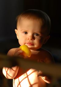 Portrait of baby with rubber duck