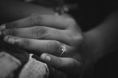 Close-up of people on hands