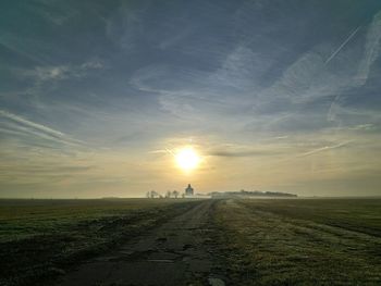 Scenic view of landscape at sunset