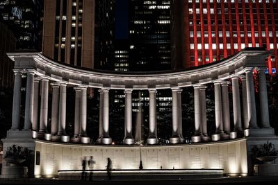 Illuminated modern building in city at night