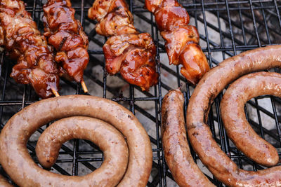 Close-up of meat on barbecue grill