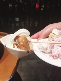 Close-up of ice cream served on table