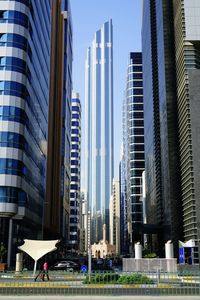 Skyscrapers in city against sky