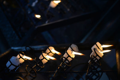 Close-up of illuminated lighting equipment