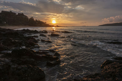 Scenic view of sea against sky during sunset