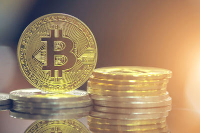 Close-up of coins on table