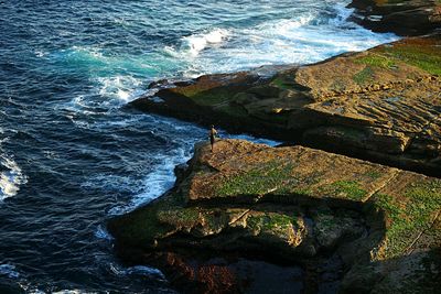 Waves splashing on rocks