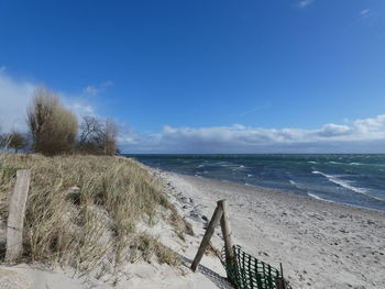Scenic view of beach against sky