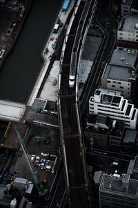 High angle view of vehicles on road in city