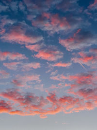 Low angle view of dramatic sky during sunset