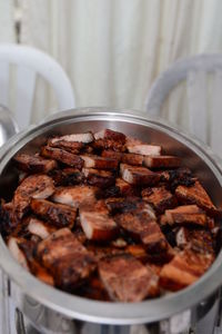 Close-up of meat in bowl on table