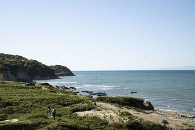 Scenic view of sea against clear sky