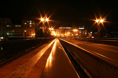 Illuminated street lights at night