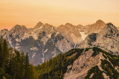 Scenic view of mountains against sky during sunset