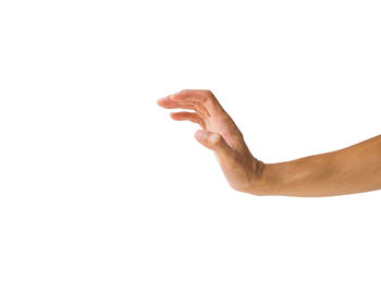 Close-up of human hand against white background