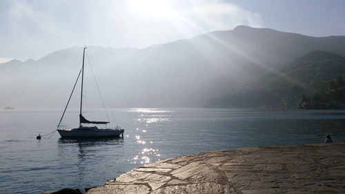 Scenic view of lake maggiore against sky during sunset