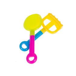 Close-up of yellow toy over white background