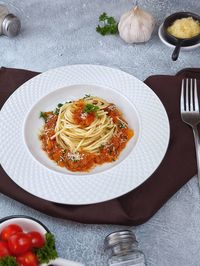 High angle view of pasta in plate on table