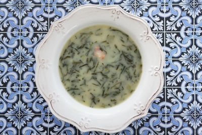 Portuguese green soup called caldo verde. top view