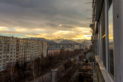 Cityscape against sky during sunset