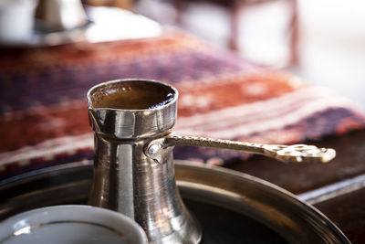 Close-up of containers on table