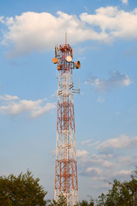 Low angle view of electricity pylon against sky