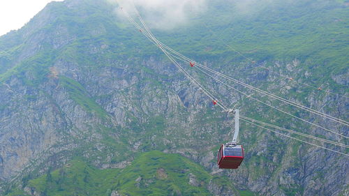 High angle view of overhead cable car against sky