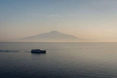 Boat on sea against sky