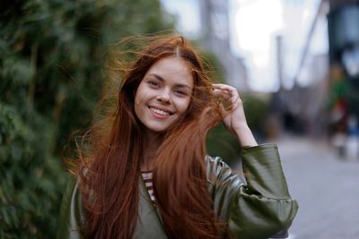 Portrait of young woman looking away