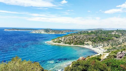 Scenic view of sea against blue sky