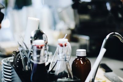 Close-up of bottles on table