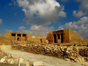 Old ruin building against cloudy sky