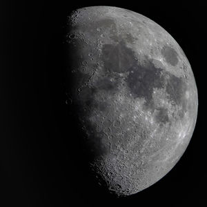 Low angle view of moon in sky at night