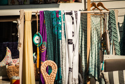 Clothes hanging in store for sale at market