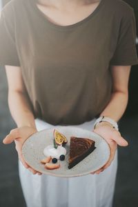 Close-up of a person holding ice cream