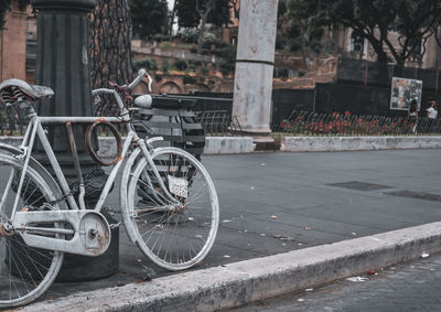 Bicycles parked on street in city