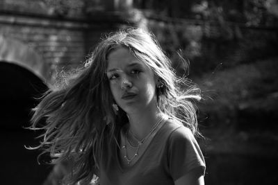 Portrait of woman with tousled hair