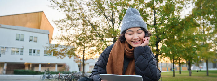 Young woman using mobile phone