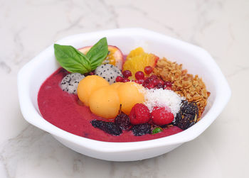 Close-up of fruits in bowl on table